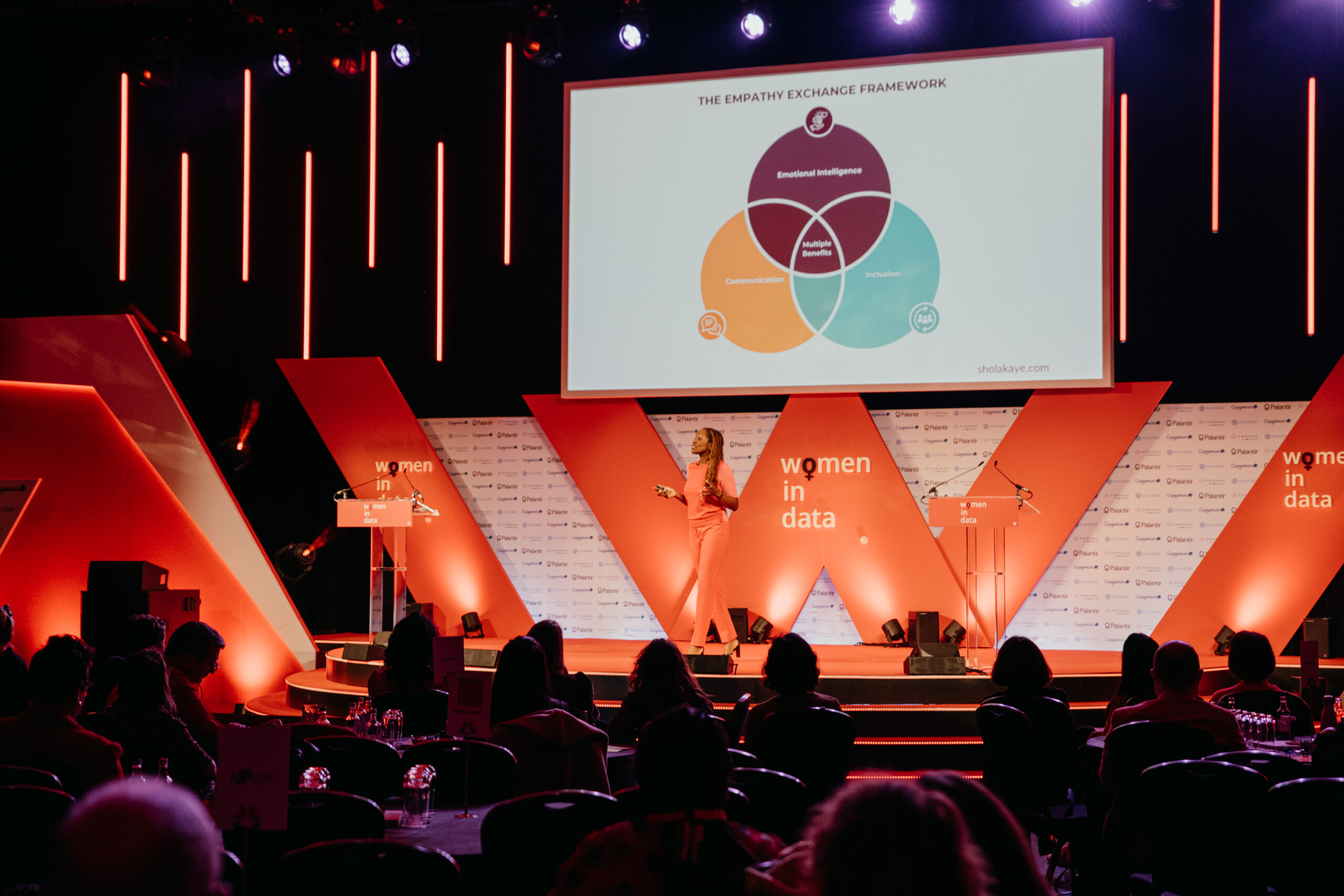 Shola in a pink jacket